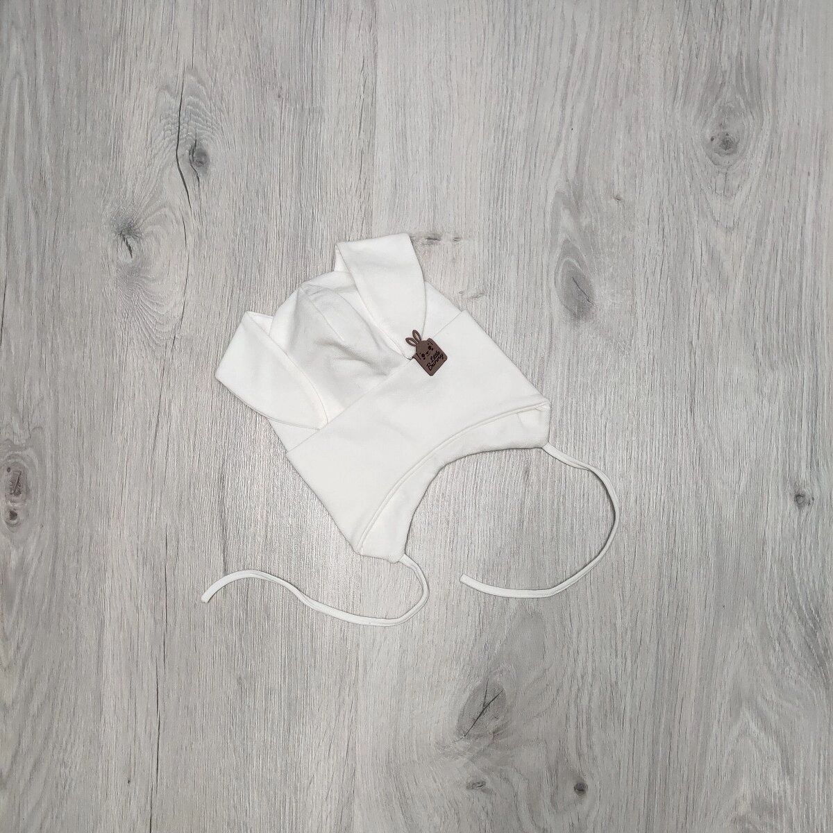 Шапка для дівчинки, із зав'язками, Little Bunny, молочна, трикотаж одинарний Sample р.46/48